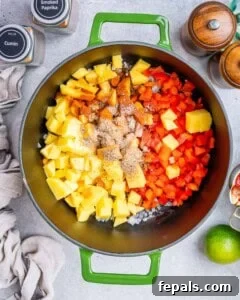 A process image showing diced vegetables and spices being sautéed in a pot.