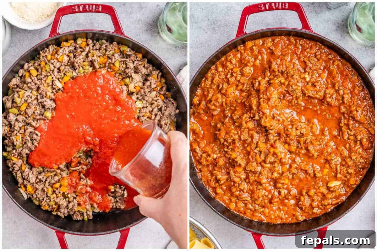 Process shot illustrating the addition of crushed tomatoes and tomato passata to the cooked ground beef, simmering to thicken.