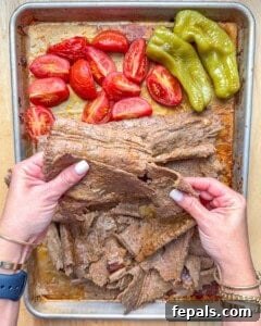 A delicious doner kebab sandwich, cut in half, ready to be enjoyed.