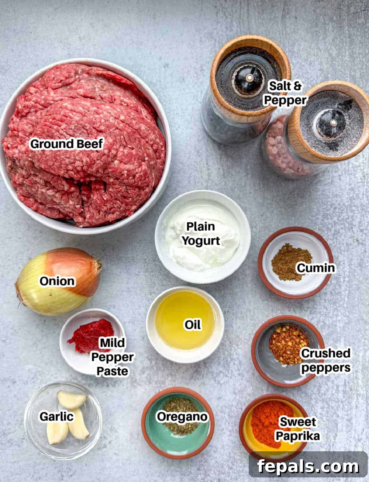 A vibrant selection of ingredients laid out on a cutting board, ready to be prepared for the doner kebab recipe.
