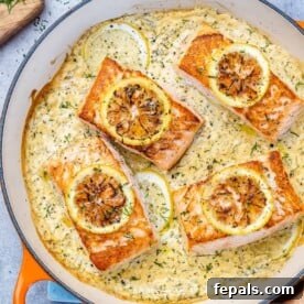 Top view salmon fillets in a creamy lemon sauce