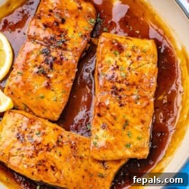 Top view of 3 honey glazed salmon fillets