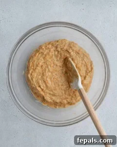 muffin batter mixed in a bowl.
