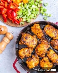 Chicken browning in a skillet