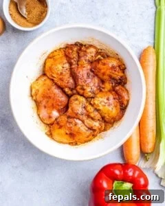 Marinated chicken thighs in a bowl