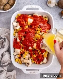 Adding ingredients to the baking dish.