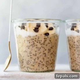 A side shot of inviting espresso overnight oats layered with chia pudding in a jar, elegantly topped with sliced bananas and delightful chocolate chips.