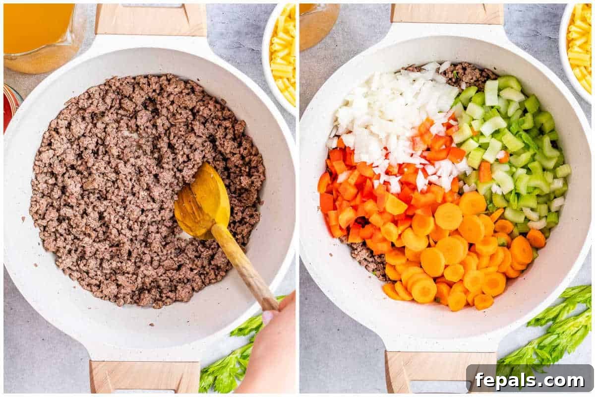 Process shot showing ground beef browning in a Dutch oven, with chopped vegetables ready to be added.