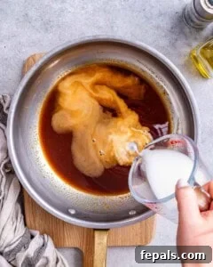 Making the teriyaki sauce in a bowl.