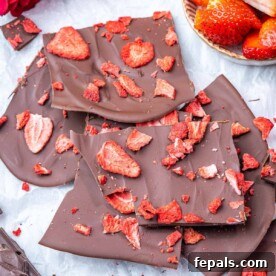 Valentine's Day Recipes for Grown-Ups 20 top view chocolate bark pieces topped with dried strawberries