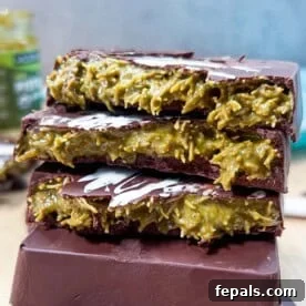 Valentine's Day Recipes for Grown-Ups 21 3 halved chocolate bars stuffed with pistachio cream are stacked over each other on a cutting board.