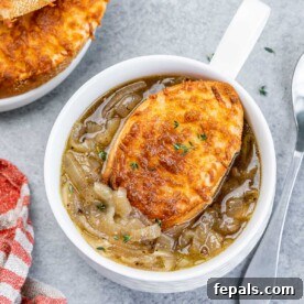 Valentine's Day Recipes for Grown-Ups 6 top view of a small bowl of french onion soup topped with cheesy toast over the soup