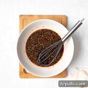 Your Own Signature Teriyaki Sauce 8 All teriyaki sauce ingredients in a bowl before cooking.