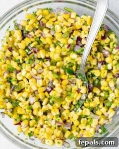 The finished corn salsa mixed in a bowl.