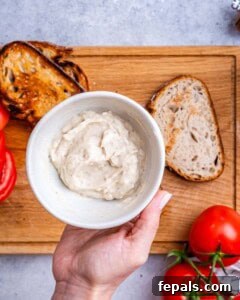 a bowl with the mayo mixture for the sandwich.