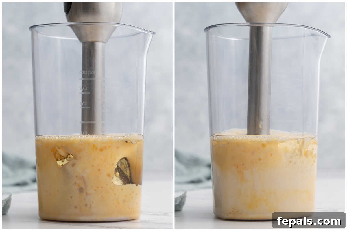 blending the ingredients in a jar to make homemade mayo.