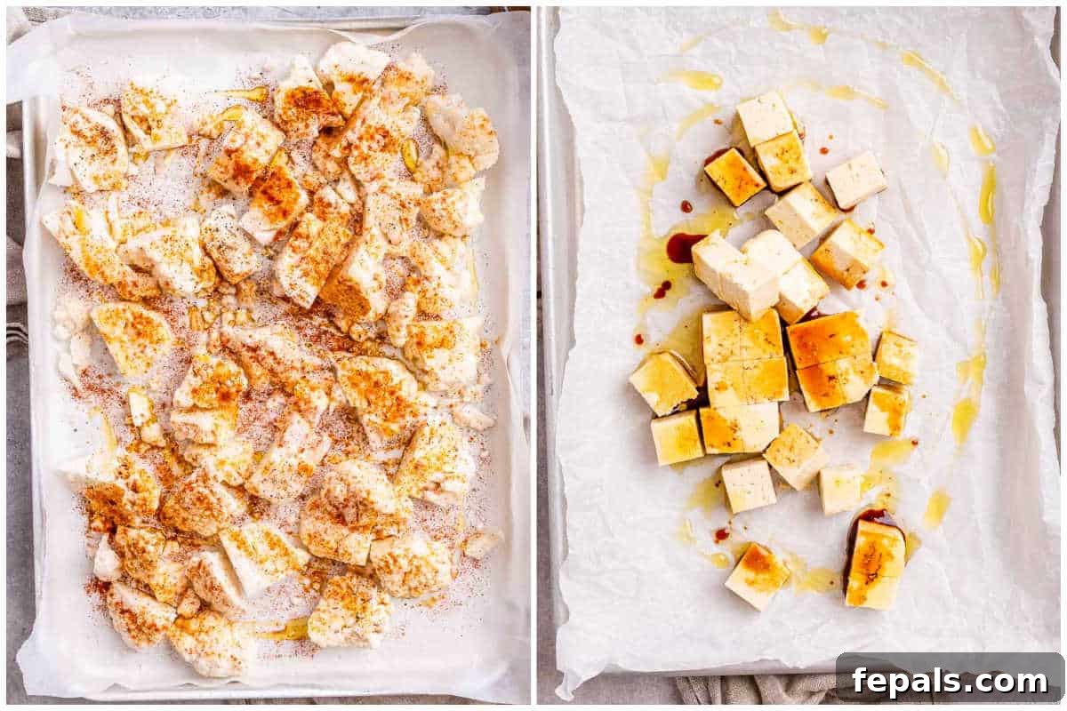 Crispy Orange Tofu 4 Seasoned cauliflower florets and tofu bites arranged in separate sheet pans, ready for baking.