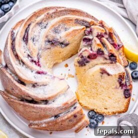 bundt cake with blueberries on a plate