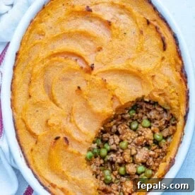 top view of an oval dish with a Healthy sweet potato shepherd's pie