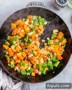 Sautéing vegetables and deglazing skillet