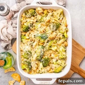 A baked Chicken Divan casserole with melted cheese and crispy cracker topping.