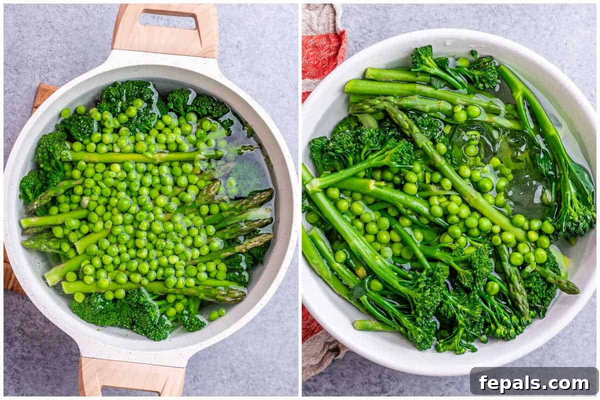 Process shot showing blanched broccoli, asparagus, and peas being transferred from boiling water into an ice bath to cool rapidly.