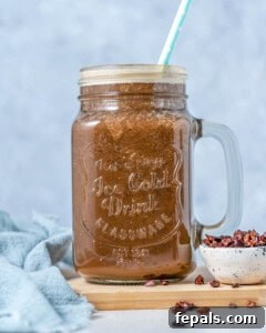 a jar filled with coffee protein shake.