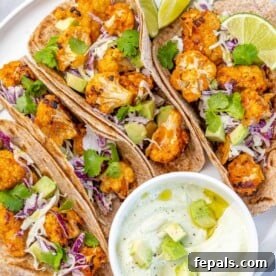 Effortless Cinco De Mayo Feast 6 top view cauliflower tacos with sauce on the side