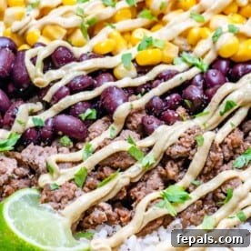 Effortless Cinco De Mayo Feast 10 close up view of burrito bowl with ground beef, rice, beans, and corn