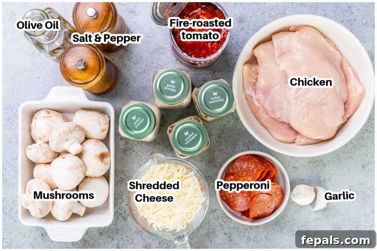 Homestyle Chicken Pizzaiola 3 A collection of fresh ingredients laid out for making chicken pizzaiola, including chicken breasts, tomatoes, cheese, mushrooms, and herbs.