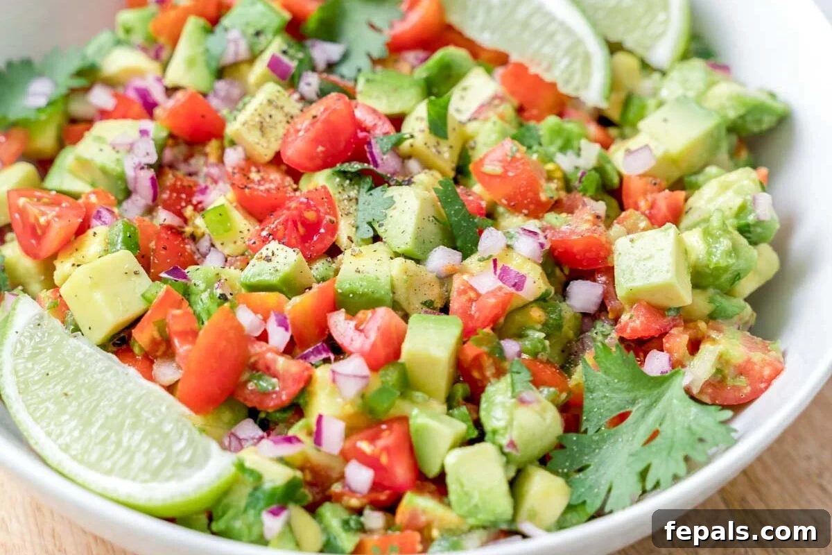 A close-up shot of the finished avocado salsa served in a stylish bowl, highlighting its fresh ingredients and vibrant colors.