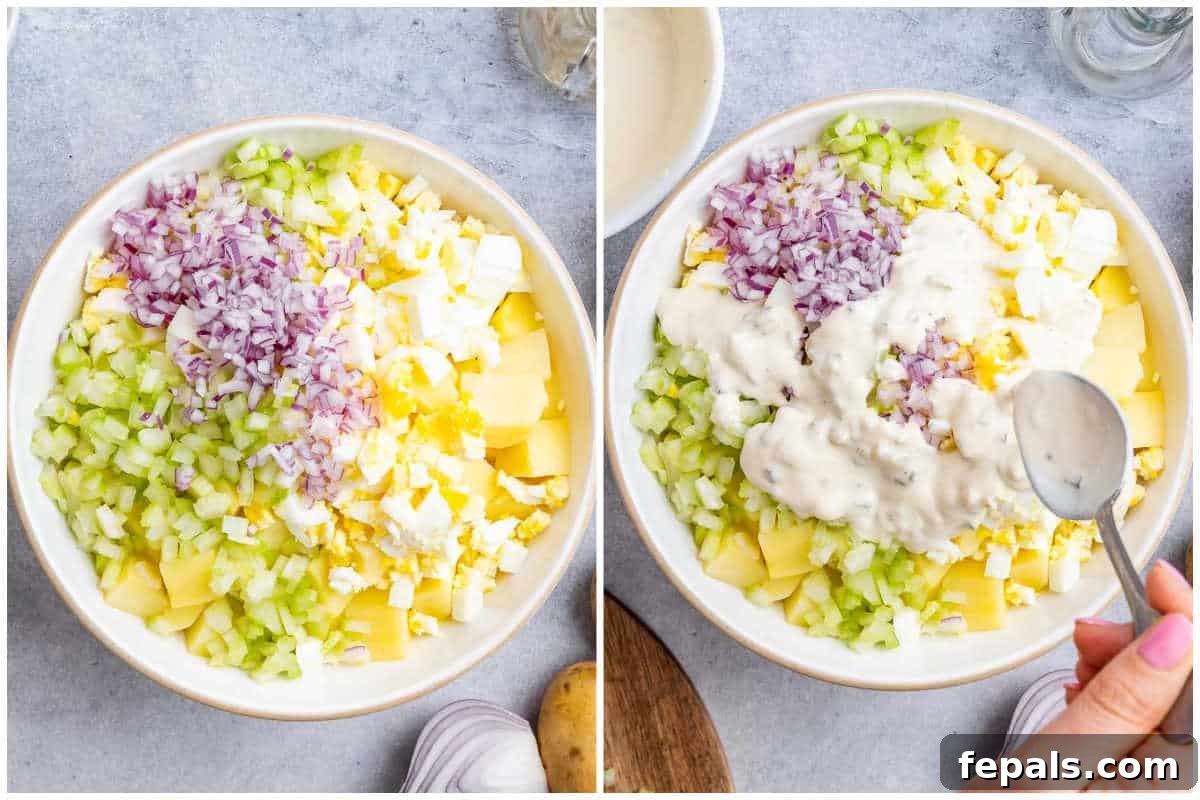 Process shot showing all salad ingredients added to a large bowl, ready for mixing.