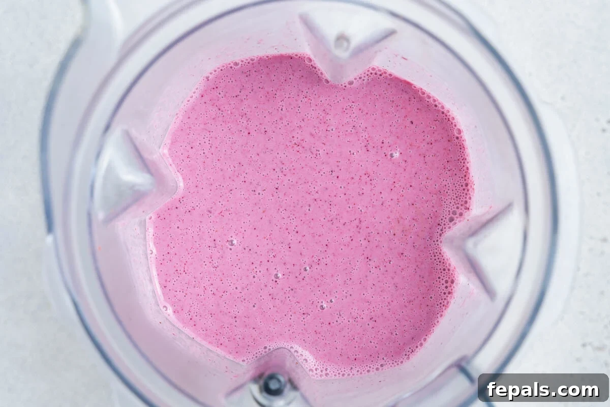 Creamy Strawberry Blueberry Smoothie with Greek Yogurt 6 smoothie blended in a blender.
