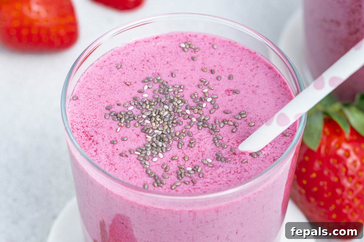 Creamy Strawberry Blueberry Smoothie with Greek Yogurt 8 a cup of purple colored berry smoothie.