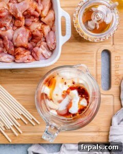 Firecracker Chicken Skewers 9 Mixing the bang bang sauce in a bowl