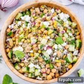 Top BBQ Side Dishes: 18+ Recipes for Summer Gatherings 5 top view green salad with chickpeas topped with crumbled cheese in a wooden round bowl