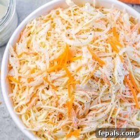 Top BBQ Side Dishes: 18+ Recipes for Summer Gatherings 7 top view close up image of close slaw salad in a white bowl