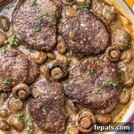 15-Minute Beef Dinners for Busy Weeknights 14 top view of steaks and mushroom in a pan