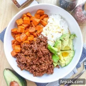 15-Minute Beef Dinners for Busy Weeknights 3 a bowl with ground beef, roasted potatoes, avocado, and cottage cheese.