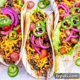 15-Minute Beef Dinners for Busy Weeknights 6 Beef tacos on a cutting board.