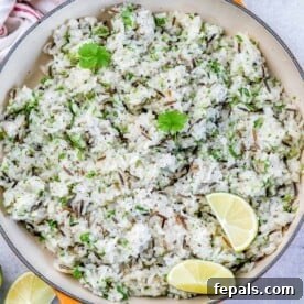 top view of wild rice made with cilantro and lime in an orange skillet