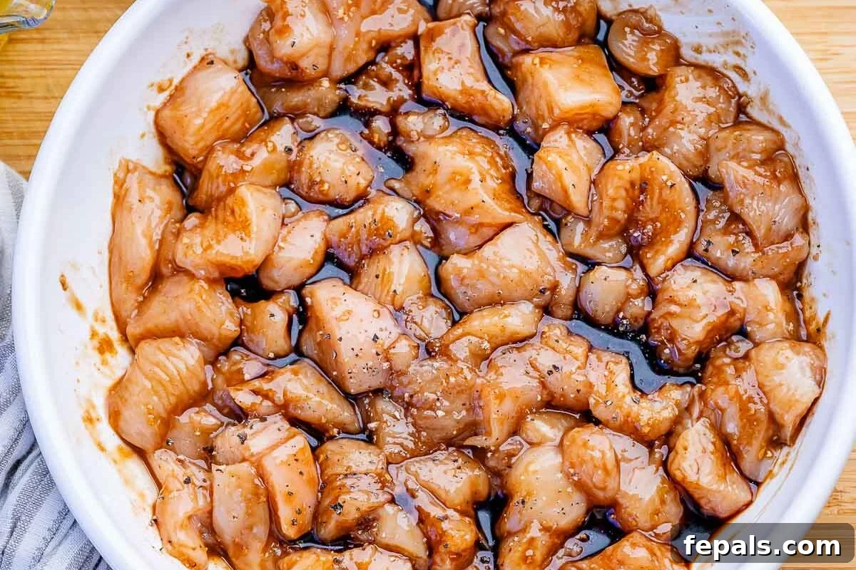 Quick BBQ Chicken Flatbread Recipe for Weeknight Dinner 4 marinating chicken bites in a bow.