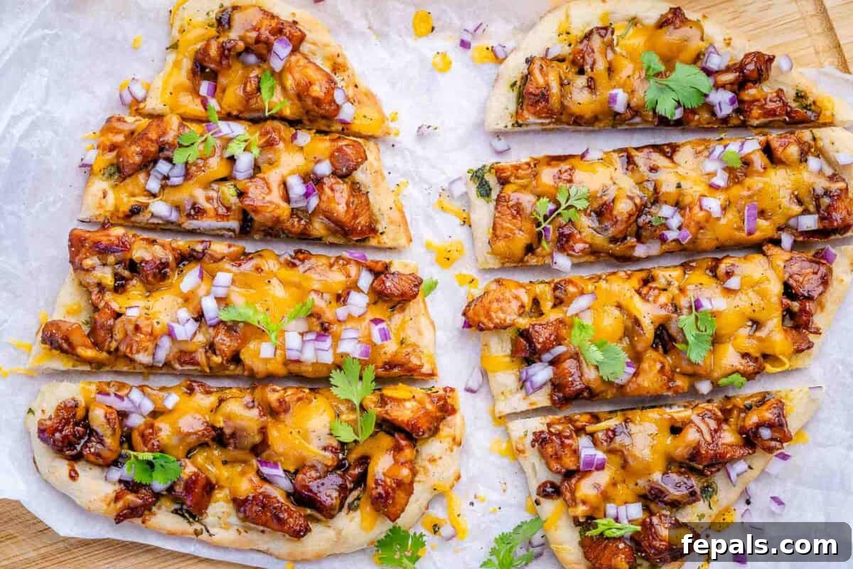 Quick BBQ Chicken Flatbread Recipe for Weeknight Dinner 8 2 sliced bbq chicken flatbread next to each other.