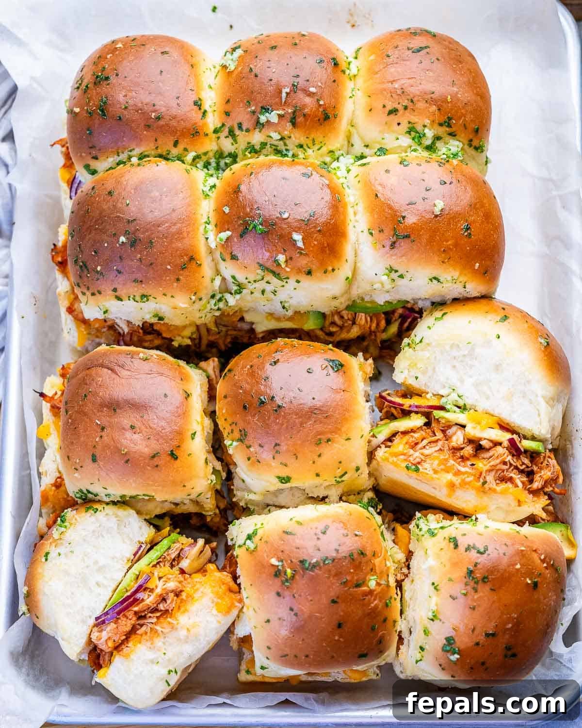bbq chicken sliders next to each other.