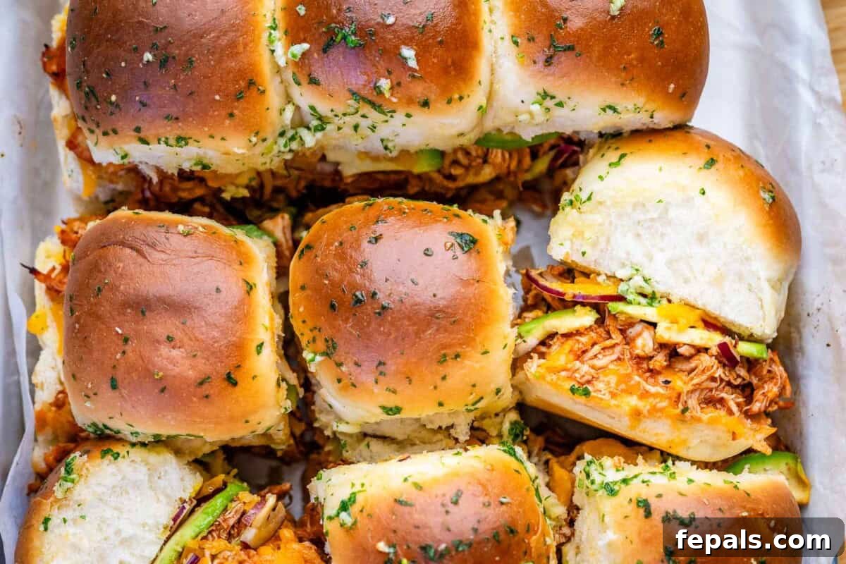 chicken sliders stacked next to each other.