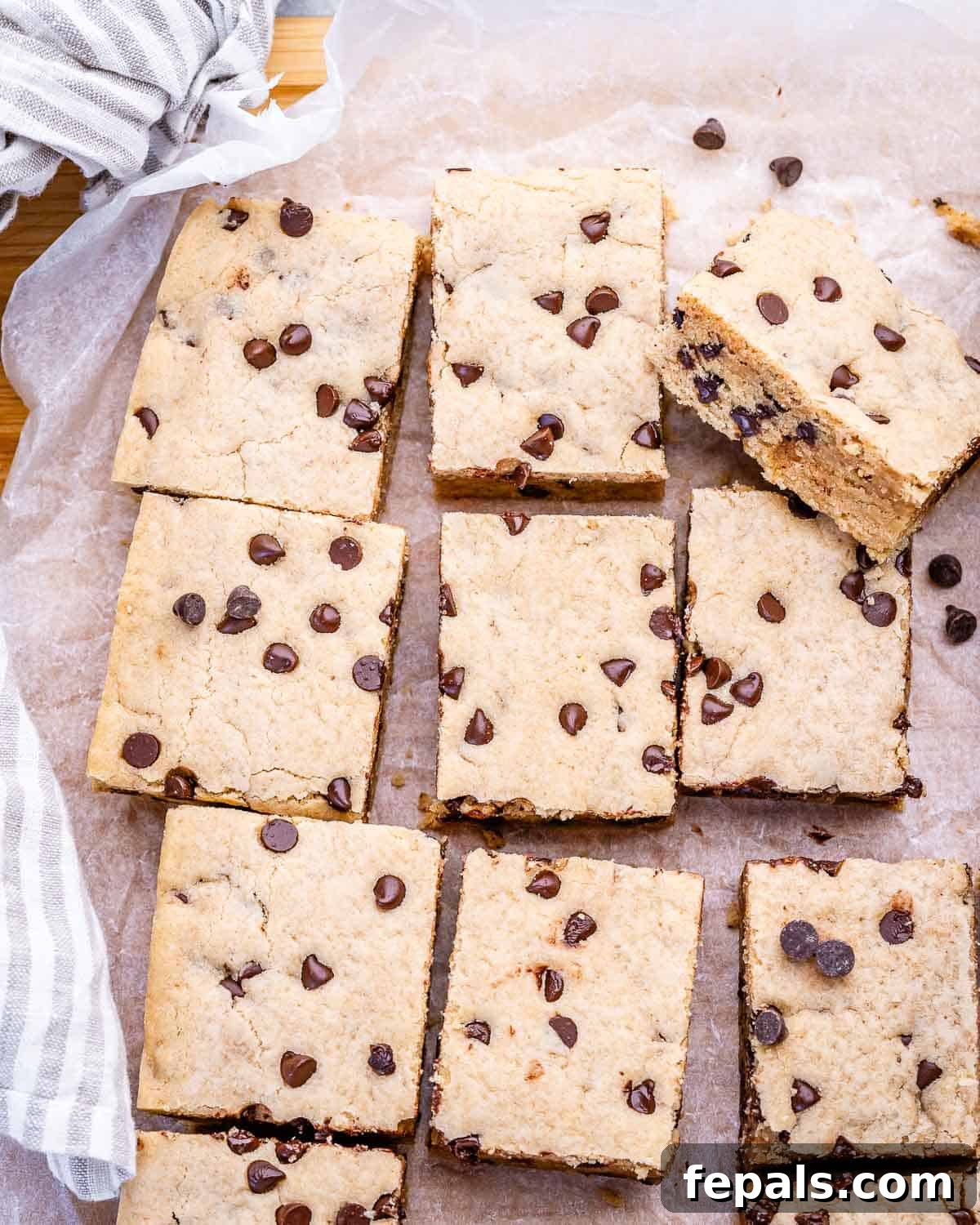 Soft Chewy Chocolate Chip Cookie Bars Recipe 2 cookie bars being cooled on a flat surface.
