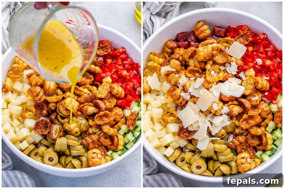 Crispy Air Fryer Pasta Salad with Zesty Herbs 6 process shot of drizzling the salad and then topping with shaved parmesan.