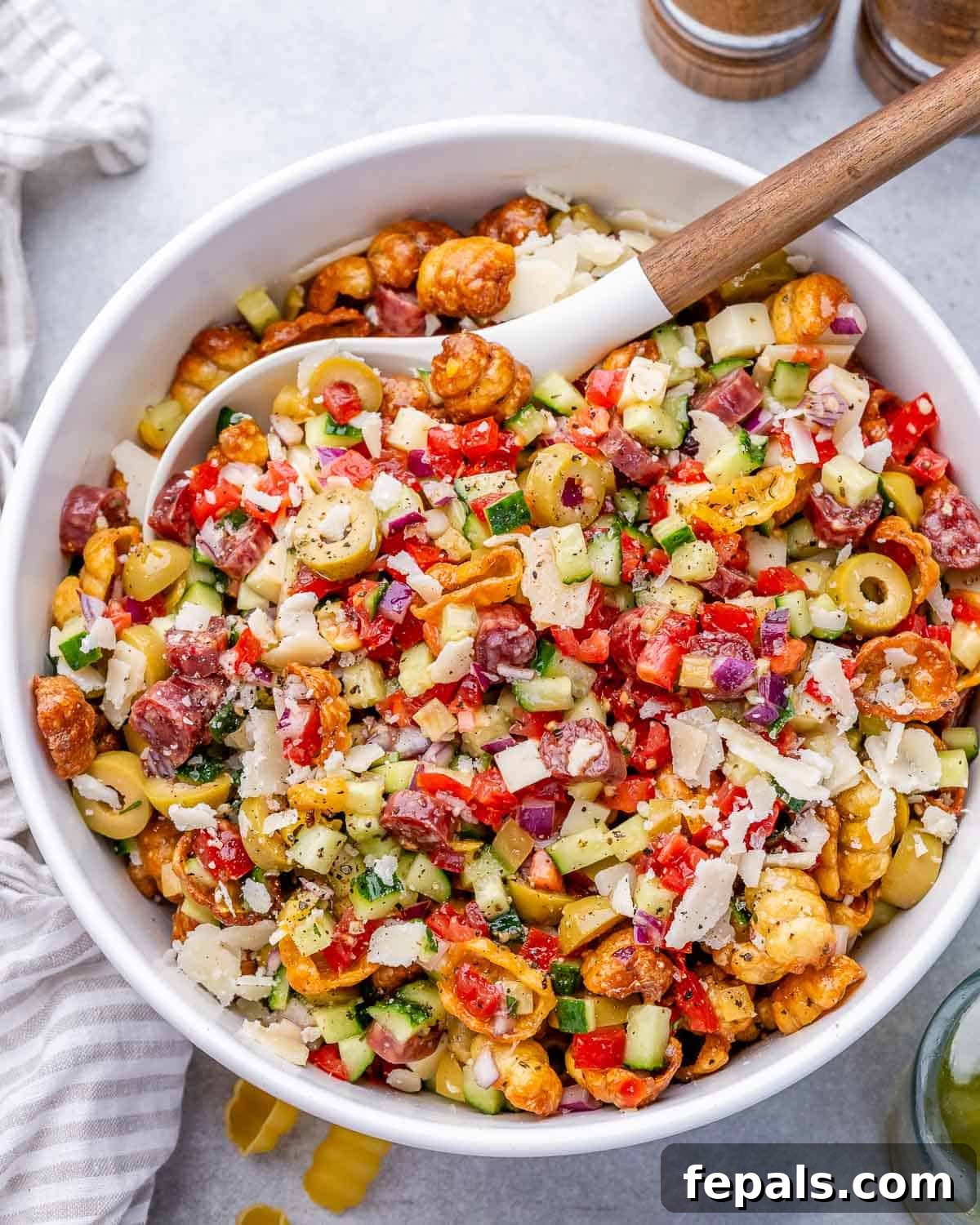 Crispy Air Fryer Pasta Salad with Zesty Herbs 8 spoon a bowl with crispy pasta salad.