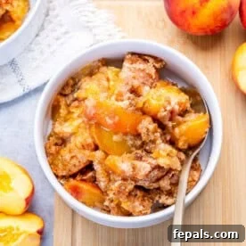 Fresh Peach Dump Cake Recipe with Ripe Peaches 8 a bowl with peach dump cake.