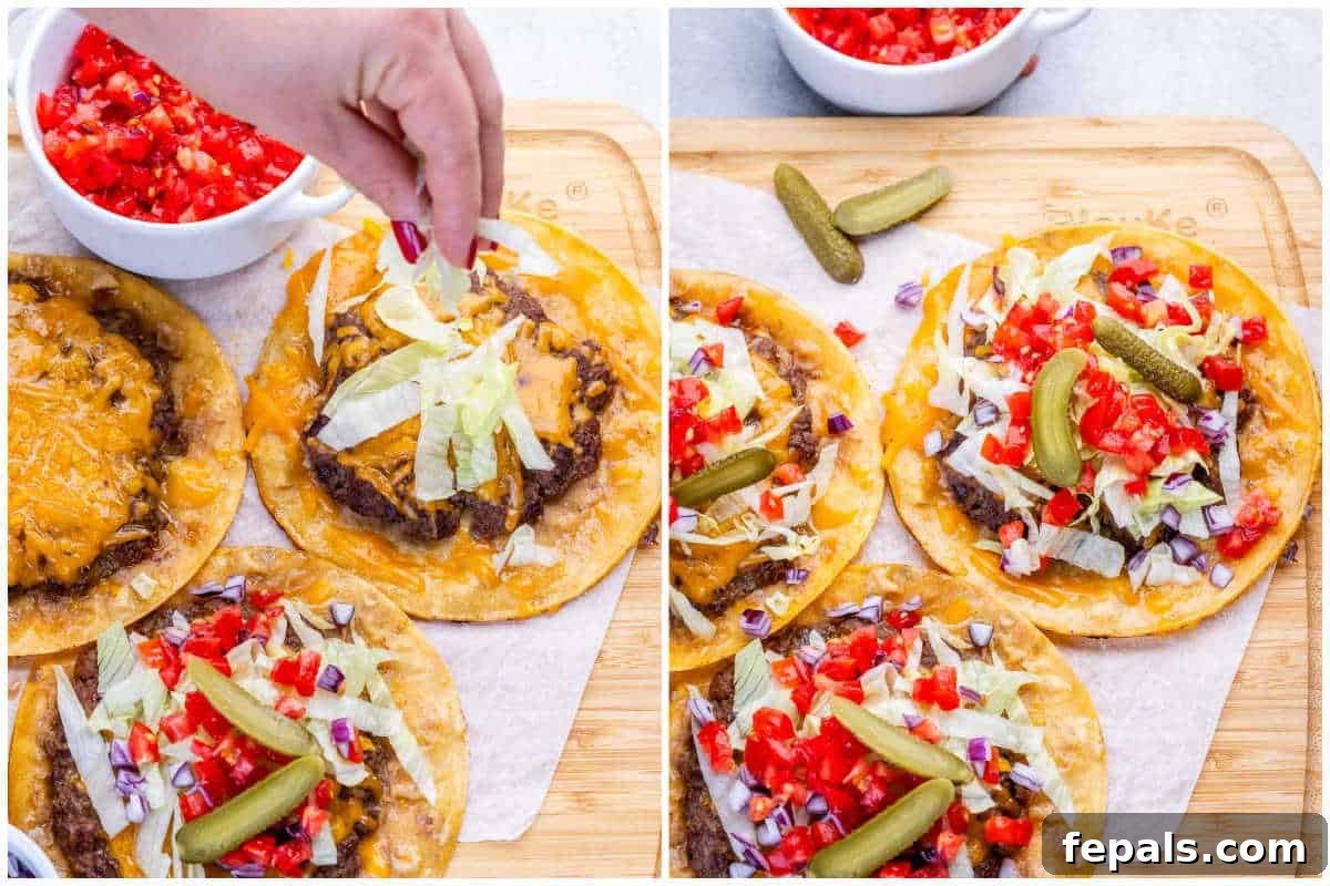 adding toppings to the smash burger tacos.
